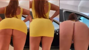 Michelly pelirroja balanceándose en el columpio con un vestido levantado y sin bragas