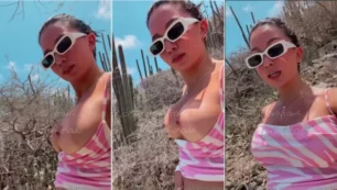 Karol Rosado colombiana muy atrevida mostrando sus tetas por fuera de la blusa en un locación al aire libre