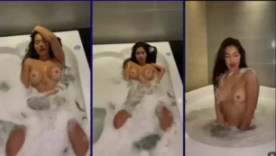 Nena muestra sus tetas mientras se relaja en la bañera