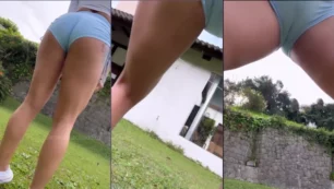 Carol Machado, influencer fitness, haciendo ejercicios en el jardín con shorts ajustados