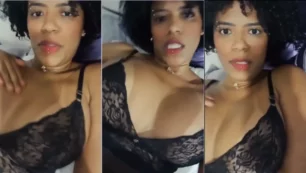 Nega Barbie brasileña tocándose las tetas con braguitas negras transparentes