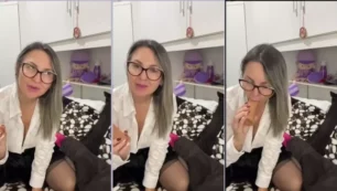 La maestra Carla realizando sexo oral a un consolador con actitud provocativa