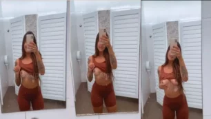 Rissa exhibiendo sus pechos al natural en el área de baños del centro deportivo