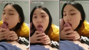 Estudiante china llamada June Liu realizando una sensual mamada desde un punto de vista